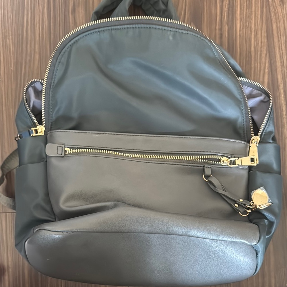 Grey Backpack with Gold Details